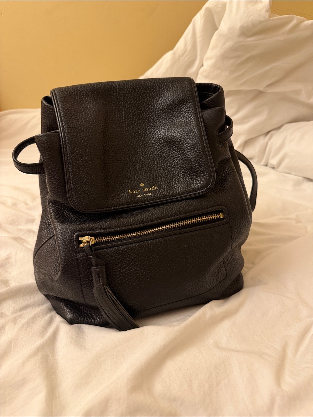 kate spade black leather drawstring backpack with gold zipper